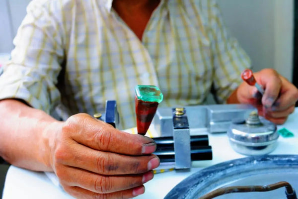 Engraver cuts square emerald gemstone