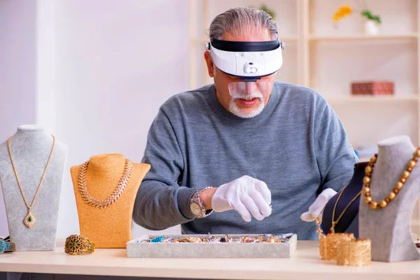 The master is repairing jewelry