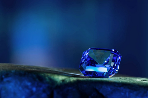 precious blue sapphire gemstone dark background
