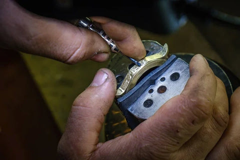 engravers hands engraving gold watch blank handmade watch production