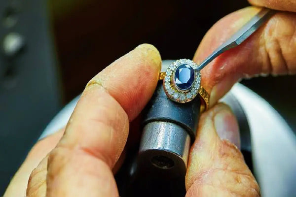 stock-photo-jewelry-production-the-process-of-fixing-stones